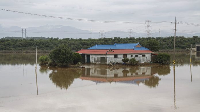 18 die in South Korea floods as storms hits China
