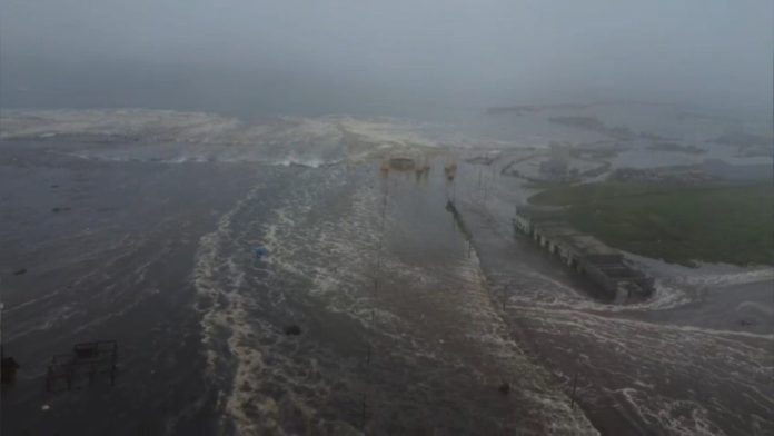 Pacific tsunami warnings downgraded after evacuations