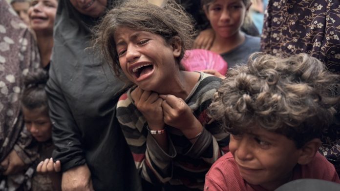Israel attacks Gaza hospital, advances displacement plans