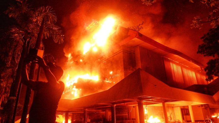 Three killed in blaze during protest in Indonesia