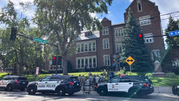 Three killed, 17 wounded in shooting at Minneapolis school Three dead, 17 injured in Minneapolis school shooting