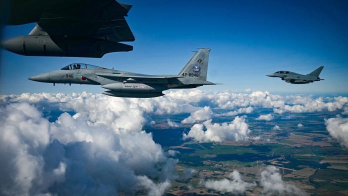 NATO warns Russia to stop air violations over east flank