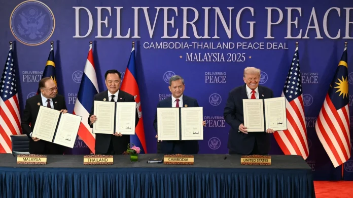 Trump presides over ceasefire signing at his first stop in Trump oversees truce signing on first Asia stop
