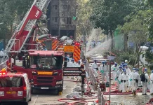 Hong Kong Declares Period of Mourning After Blaze Kills 128 Hong Kong begins mourning period as 128 killed in fire