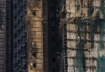 Hong Kong apartment fire death toll climbs to 128 Death toll from Hong Kong apartments fire rises to 128