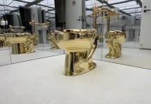 Video shows fully operational solid-gold toilet sold for $12 million Watch: Fully functional gold toilet sells for $12m