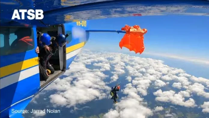 Caught on camera: Parachutist left hanging from plane's tail mid-air Watch: Moment skydiver left dangling on plane's tail