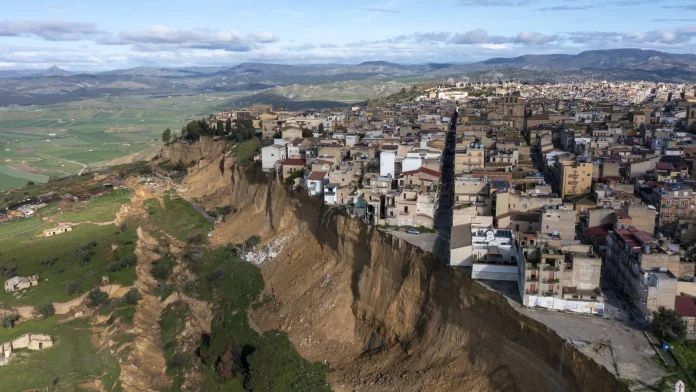 After fierce storms, landslide leaves Sicilian town teetering on cliff Landslide leaves Sicilian town on cliff edge after storms