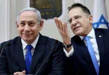 Israeli police arrest senior Netanyahu aide amid official investigation Israeli police detain senior aide to Netanyahu