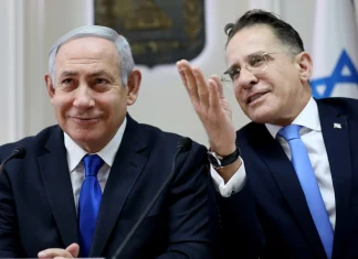 Israeli police arrest senior Netanyahu aide amid official investigation Israeli police detain senior aide to Netanyahu