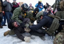 Inkabadan Kun askri oo ICE ah oo laga saaray Minnesota.