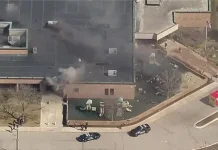 Armed suspect and security officer exchange gunfire at Michigan synagogue Gunman, security exchange fire at Michigan synagogue