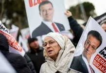 Imprisoned Erdogan Opponent Sparks Clash with Judge at Trial Start Jailed Erdogan rival clashes with judge as trial begins