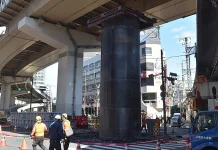 Unknown massive steel cylinder snarls traffic on Japanese highway Mysterious large steel cylinder disrupts traffic in Japan