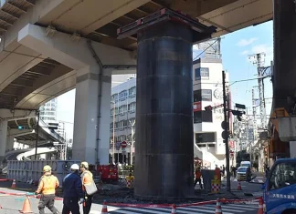 Unknown massive steel cylinder snarls traffic on Japanese highway Mysterious large steel cylinder disrupts traffic in Japan