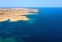 Ships off Italy rescue 32 migrants, charity says 71 unaccounted for Ships near Italy rescue 32 migrants, 71 missing - charity