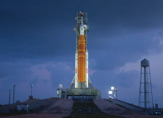 Sightseers flock to witness history as Moon launch draws near Tourists gather to 'witness history' ahead of Moon launch