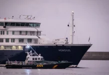 Evacuation underway for virus-stricken vessel off Tenerife coast Evacuation of virus-hit ship begins off coast of Tenerife