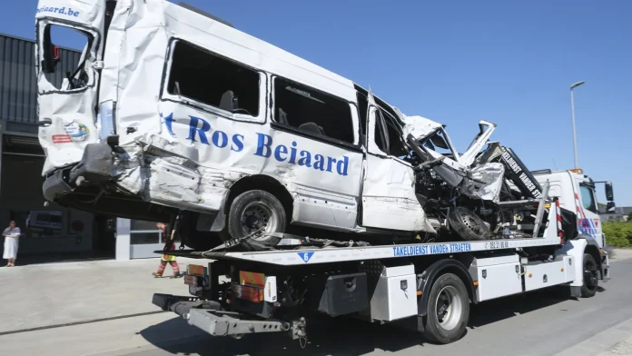 Four killed after train collides with school bus in Belgium Four dead after train hits school bus in Belgium