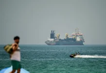 Global oil dips as Middle East fighting curbs deeper price losses Global oil slips but Middle East fighting limits losses