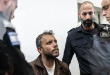 Israeli authorities prolong detention of flotilla activists into the weekend Israel extends detention of flotilla activists to weekend