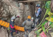 One rescued as six still trapped inside a cave in Laos One man rescued, six remain trapped in Laos cave