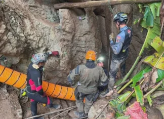 One rescued as six still trapped inside a cave in Laos One man rescued, six remain trapped in Laos cave
