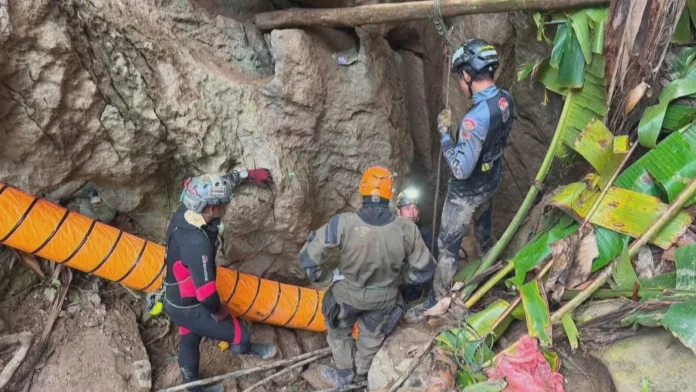 One man rescued, six remain trapped in Laos cave