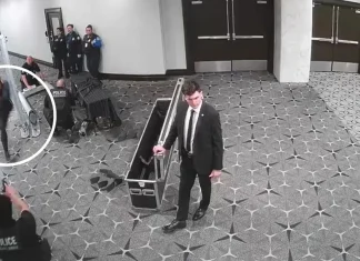 Security footage captures suspected gala shooter charging through checkpoint CCTV shows gala shooting suspect charge through security