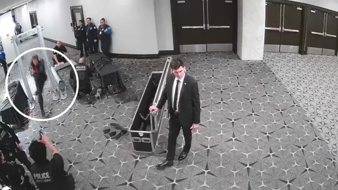 CCTV shows gala shooting suspect charge through security