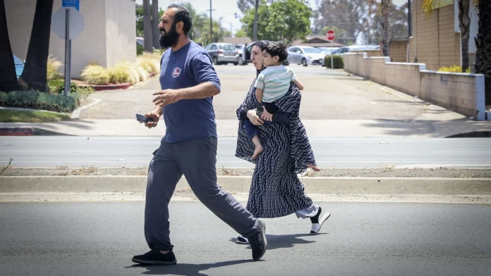Three men, two suspects dead after US mosque shooting