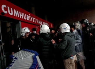 Turkish riot police raid opposition party headquarters amid rising political tensions Turkish riot police storm opposition party building
