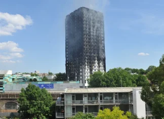 Grenfell anniversary walk held ahead of planned tower demolition Grenfell walk on anniversary before tower's demolition