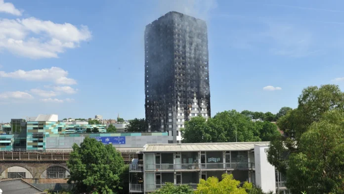 Grenfell anniversary walk held ahead of planned tower demolition Grenfell walk on anniversary before tower's demolition