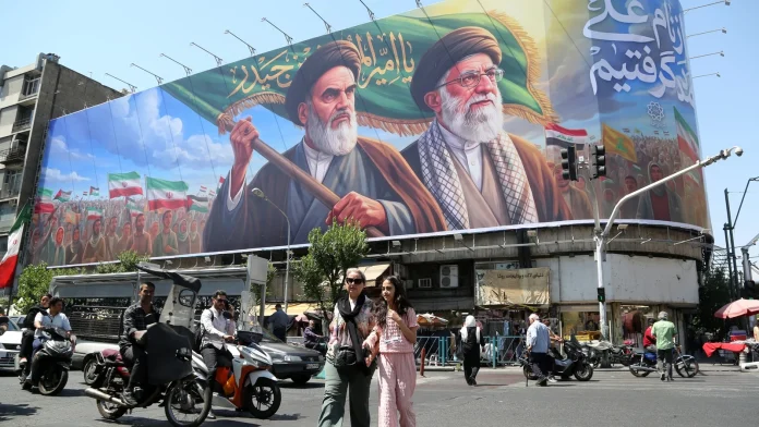 Iran, Israel halt strikes but warn of further retaliation