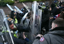 Protesters and police clash in England following Nowak murder Protesters clash with police in England over Nowak murder