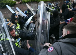 Protesters and police clash in England following Nowak murder Protesters clash with police in England over Nowak murder