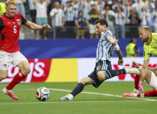 Record-setting Messi propels Argentina into the World Cup last 32 Record-breaking Messi sends Argentina into last 32