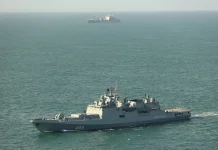 Russian vessel fires warning shots at yacht off UK waters Russian ship fires warning shots at yacht near UK waters