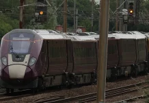 UK train driver killed in crash reportedly ran past red stop signal Train driver killed in UK crash 'passed' red stop signal