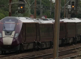 UK train driver killed in crash reportedly ran past red stop signal Train driver killed in UK crash 'passed' red stop signal