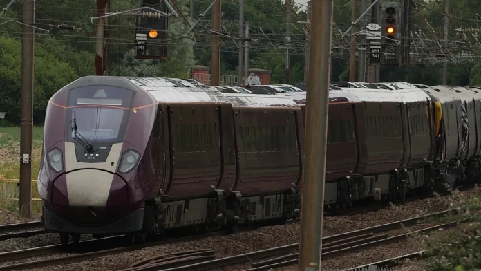Train driver killed in UK crash 'passed' red stop signal