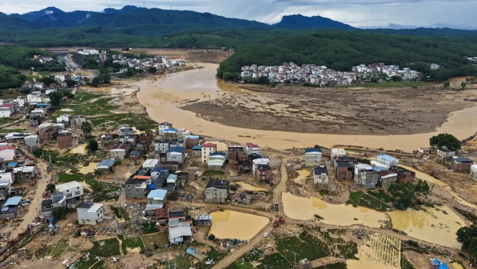 China Storm Death Toll Climbs as Dozens Remain Missing China storm death toll rises with dozens missing