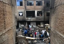Peru blaze claims 10 lives, including five children, officials report Fire in Peru kills 10 people including 5 children