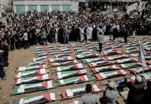 Mass funeral in Gaza honors family slain amid ongoing war Mass funeral held in Gaza for family killed during war