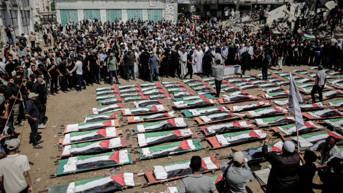 Mass funeral in Gaza honors family slain amid ongoing war Mass funeral held in Gaza for family killed during war