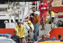 More than 170 people rescued after migrant boat fire in English Channel Over 170 rescued after boat catches fire crossing Channel