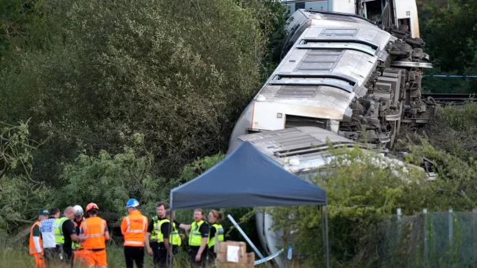 Two injured as train derails in England, emergency crews respond Two people injured after train derails in England