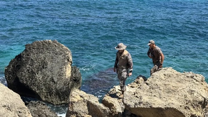 Divers searching for ferry wreckage in northern Cyprus