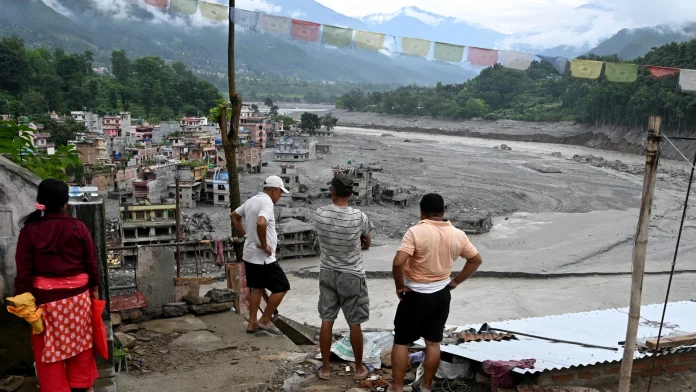 Nepal Flood Death Toll Surpasses 900 as Missing Persons Rise Nepal flood toll tops 900 as number of missing climbs